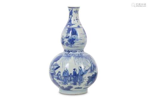 A CHINESE BLUE AND WHITE DOUBLE GOURD 'SCHOLARS' VASE.