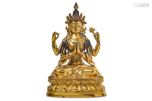 A TIBETAN GILT-BRONZE FIGURE OF GUANYIN.