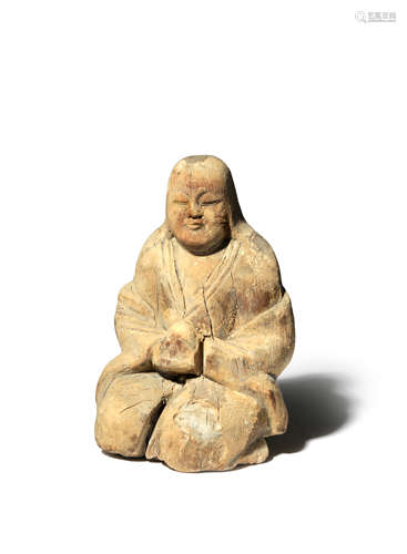 A JAPANESE HINOKI WOOD FIGURE OF A FEMALE SHINTO DEITY, SHINZO KAMAKURA OR LATER Carved from a