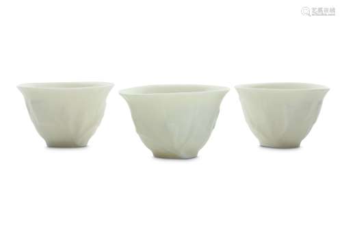 A SET OF THREE CHINESE DEHUA CUPS.