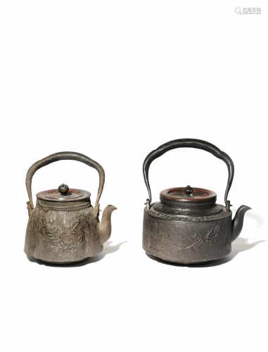 TWO JAPANESE CAST-IRON KETTLES AND COVERS, TETSUBIN 19TH/ 20TH CENTURY One cast as a tied straw