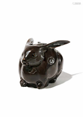 A JAPANESE BRONZE INCENSE BURNER, KORO MEIJI 1868-1912 Shaped as a small rabbit with short fangs and