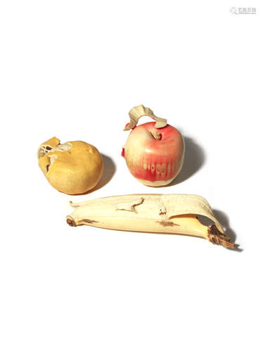 λ THREE JAPANESE IVORY CARVINGS OF FRUITS, OKIMONO MEIJI 1868-1912 Carved as an apple, a tangerine