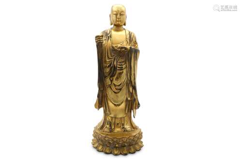 A GILT-BRONZE FIGURE OF JIZO.