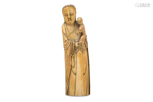 A CHINESE MARINE IVORY FIGURE OF GUANYIN AND CHILD.