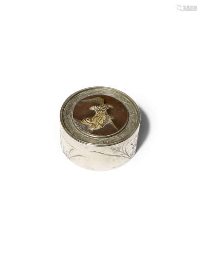 A SMALL JAPANESE MIXED METAL BOX MEIJI 1868-1912 The circular lid decorated with a roof tile
