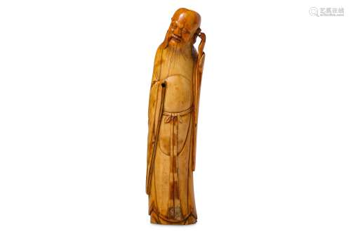 A CHINESE MARINE IVORY CARVING OF AN IMMORTAL.