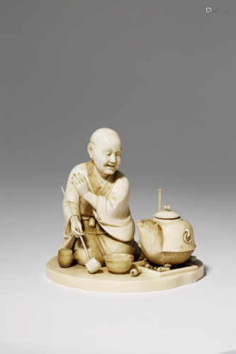 †λ A GOOD JAPANESE IVORY CARVING, OKIMONO MEIJI 1868-1912 Depicting a kneeling monk surrounded by