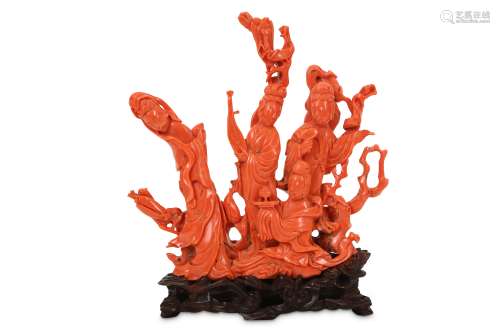 A LARGE CHINESE CORAL 'IMMORTAL MAIDENS' CARVING.