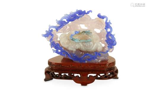 A CHINESE AGATE 'DRAGON AND CLOUDS' CARVING.