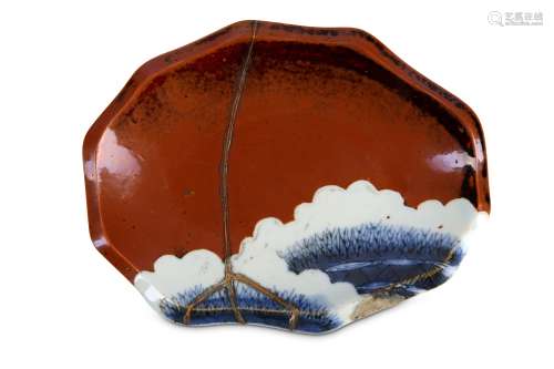 A SMALL SHAPED PORCELAIN DISH.