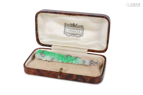 A CHINESE APPLE-GREEN JADEITE AND DIAMOND BROOCH.