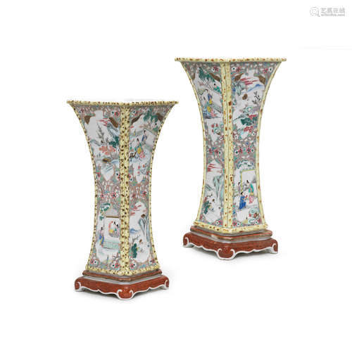 Yongzheng A rare pair of famille rose 'simulated bamboo and wood' 'Romance of the Western Chamber' vases and stands