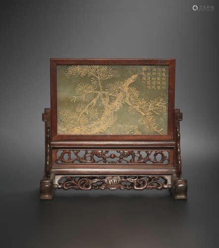 Mid Qing Dynasty A pale green jade inscribed gilt-decorated 'pine and bamboo' table screen