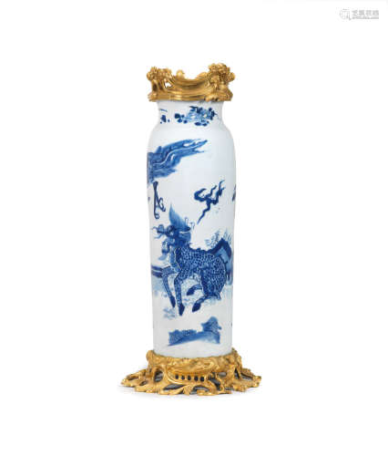 Circa 1640, with later European mounts A blue and white 'Qilin and Phoenix' sleeve vase, Rolwagen