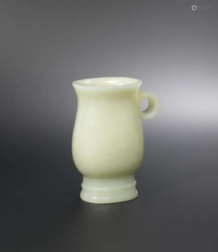 Ming Dynasty A pale green jade pouring vessel, zhi