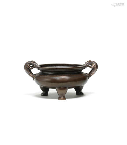 Qianlong six-character mark and of the period  A bronze tripod 'chilong' incense burner