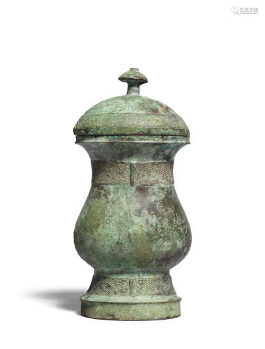 Shang Dynasty An archaic bronze wine vessel and cover, zhi