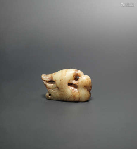 Song/Yuan Dynasty A pale green and russet jade 'eagle and bird' group
