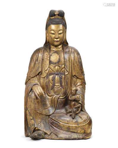 17th/18th century A large gilt-lacquered wood figure of Guanyin and boy