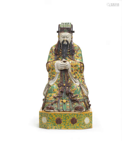 19th century A large yellow, green and aubergine-enamelled figure of Wen Chang and stand