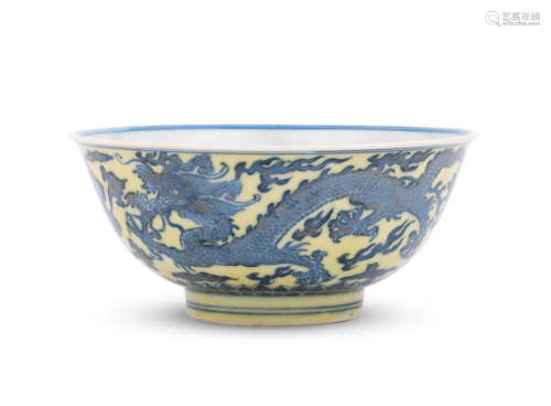 Kangxi six-character mark and of the period A rare blue and white yellow-enamelled 'dragon' bowl