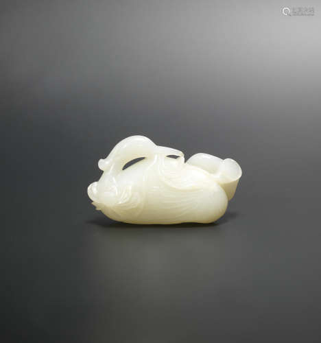 18th century A white jade carving of a Mandarin duck and lotus