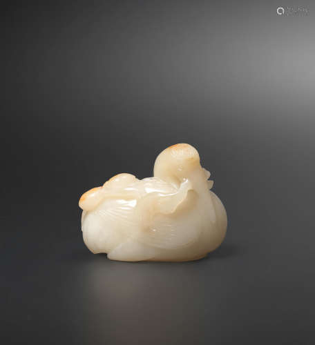 18th century  A white and russet jade carving of a crane