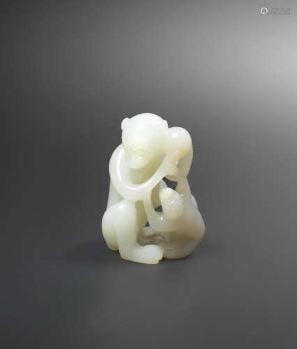 18th century  A very pale green jade carving of a monkey and young
