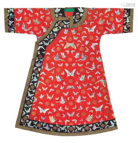 Late Qing Dynasty A red-ground silk 'butterflies' lady's informal robe