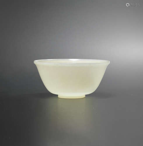 Qianlong four-character mark, and additional incised jia mark and of the period A rare white jade bowl