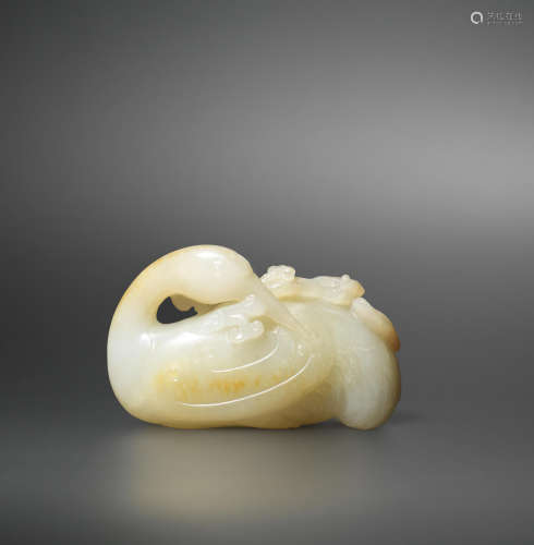 17th/18th century A pale green and russet jade carving of a crane