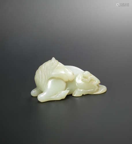 17th/18th century A pale green jade horse and monkey group