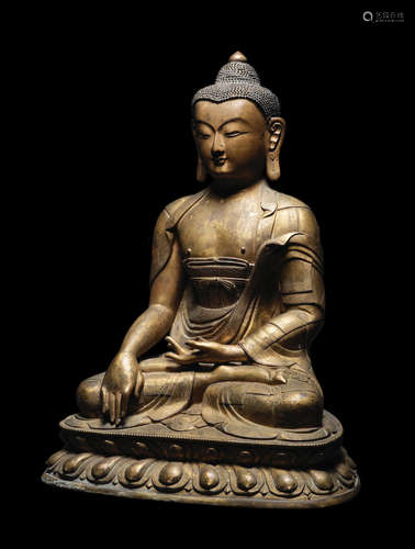 17th/18th century A magnificent and large gilt-bronze figure of Buddha Shakyamuni