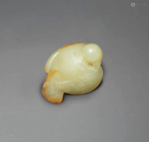 Song Dynasty A rare yellow and russet jade carving of a bird