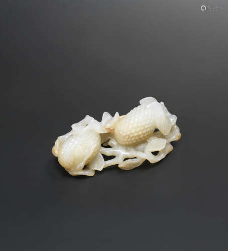 Late Ming Dynasty A very rare white and russet jade carving of lychees