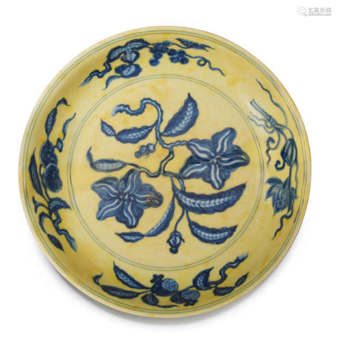 Hongzhi six-character mark and of the period A rare underglaze-blue yellow-ground 'gardenia' saucer-dish