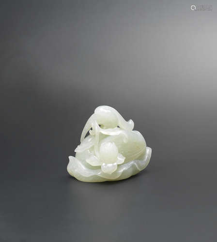 17th century  A pale green jade carving of an egret and lotus