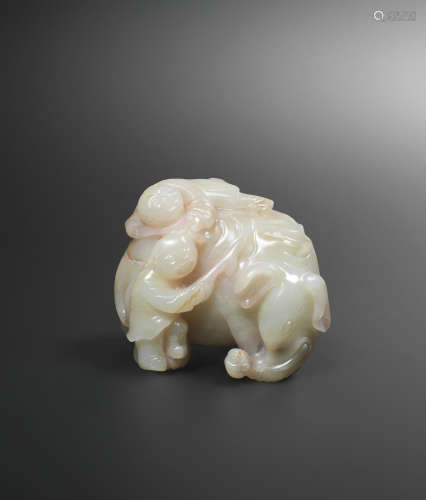 17th century  A pale green and russet jade carving of elephant and boys
