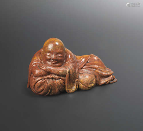 Signed Pan Yumao, incised two-character mark, Tongzhi/Guangxu A soapstone figure of a reclining monk
