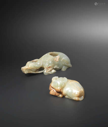 Ming Dynasty or earlier Two pale green jade carvings of water buffaloes