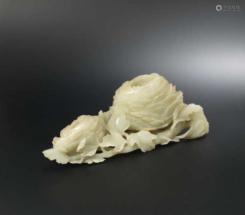 18th century A large pale green jade 'double-peony' vessel