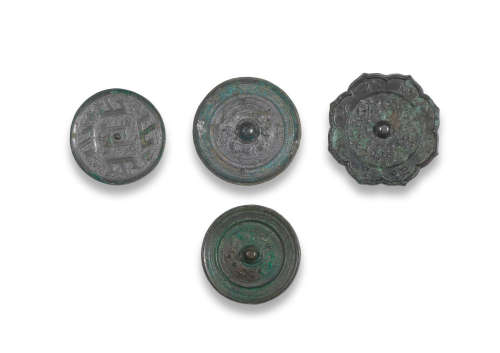 Warring States Period/Tang Dynasty  A group of four archaic bronze mirrors