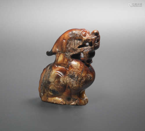 Song/Ming Dynasty A brown jade carving of a bixie