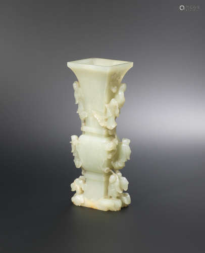Late Qing Dynasty A pale green jade 'Eight Immortals' vase, gu