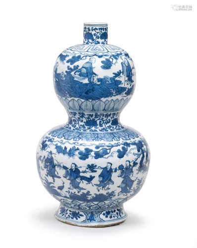 Jiajing six character mark and of the period An exceptionally rare and large blue and white 'Immortals' double-gourd vase