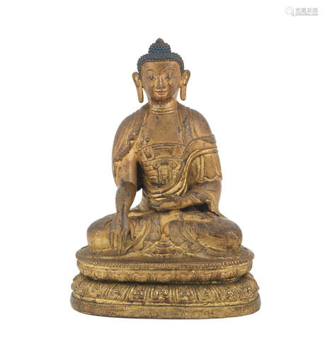 Qianlong incised seven-character mark and of the period A rare gilt-lacquer bronze repoussé figure of Buddha