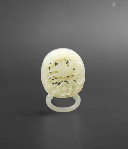 Probably Song/Jin Dynasty A reticulated white jade 'bird and flowers' belt-buckle