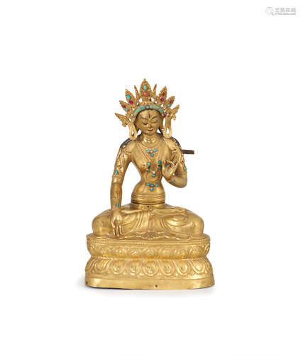 Tibet, 19th century  A large copper-alloy repoussé figure of White Tara