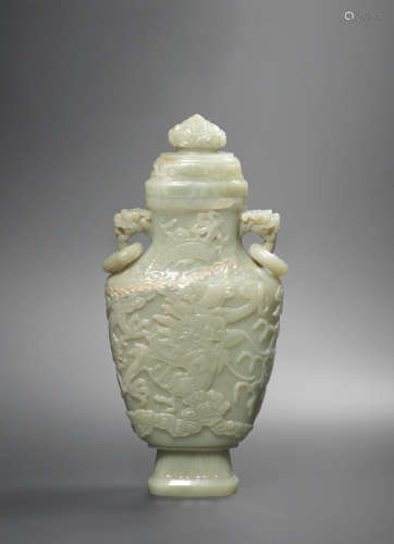 Late Qing Dynasty/Republic period A pale green jade 'dragon' vase and cover